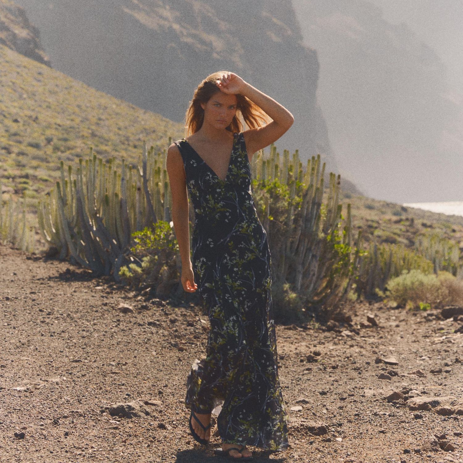 zara model in the desert wearing floral maxi dress