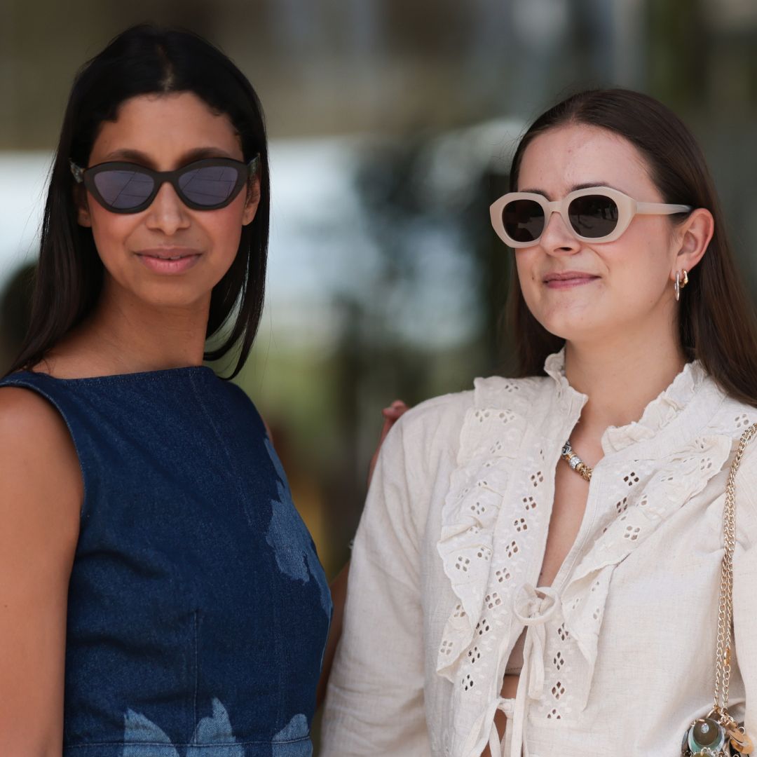 Two women wearing sunglasses during copenhagen fashion week